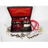 Withdrawn - A jewellery box containing a quantity of costume jewellery,