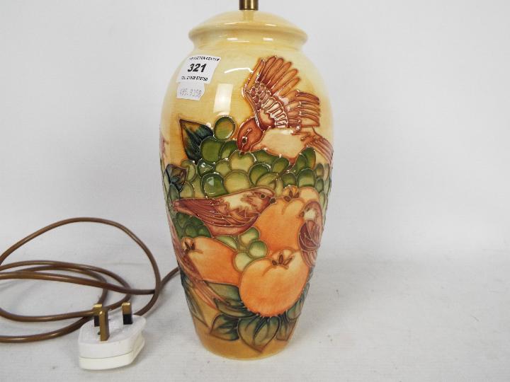 Moorcroft Pottery- a large table lamp tubelined and hand painted with finches and fruits, - Image 3 of 5