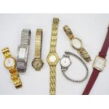 A collection of lady's wrist watches including a 9ct gold cased example