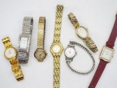 A collection of lady's wrist watches including a 9ct gold cased example