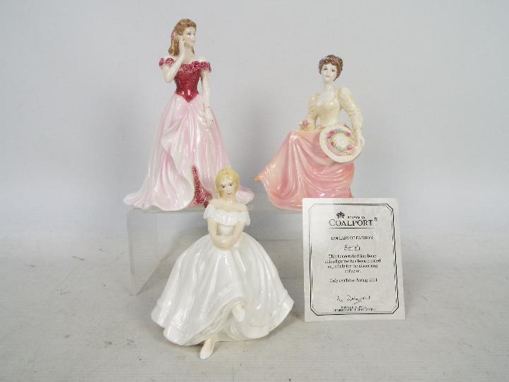 Three lady figures comprising Royal Doulton Heather # HN2956, Coalport Ladies Of Fashion,