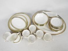 A collection of Royal Albert Paragon dinner and tea wares in the Kensington pattern,