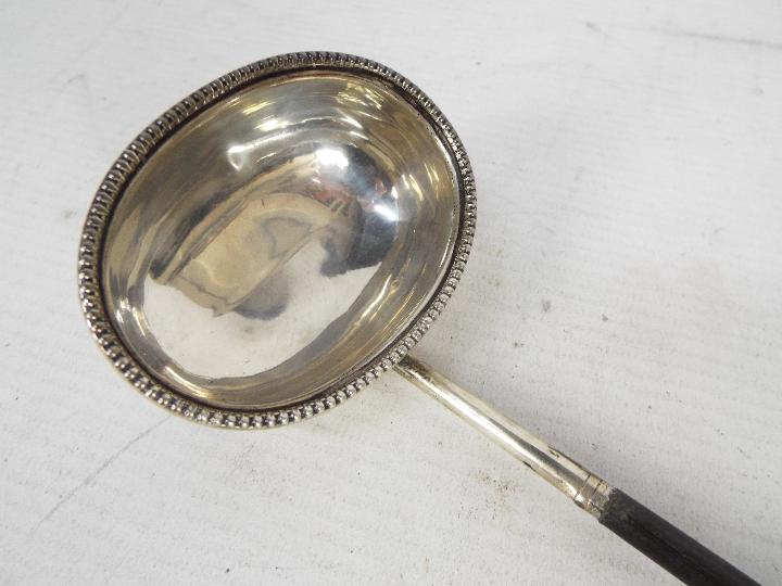 A silver toddy ladle, 35 cm (l) Condition Report: Generally good condition, - Image 2 of 5