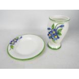 An Italian ceramic dish and vase with applied floral decoration, vase approximately 17 cm (h).