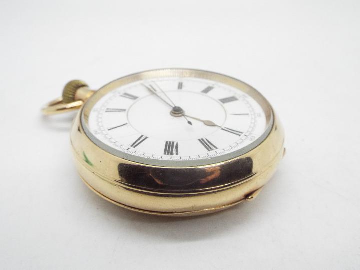 A gold plated, open faced pocket watch with Roman numerals and centre seconds, 5.5 cm case diameter. - Image 3 of 5