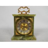 Elsinor - A Swiss 8 day mantel or desk clock, onyx, gilt mounted case, approximately 17 cm (h).