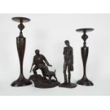 Two Heredities bronze resin figures,