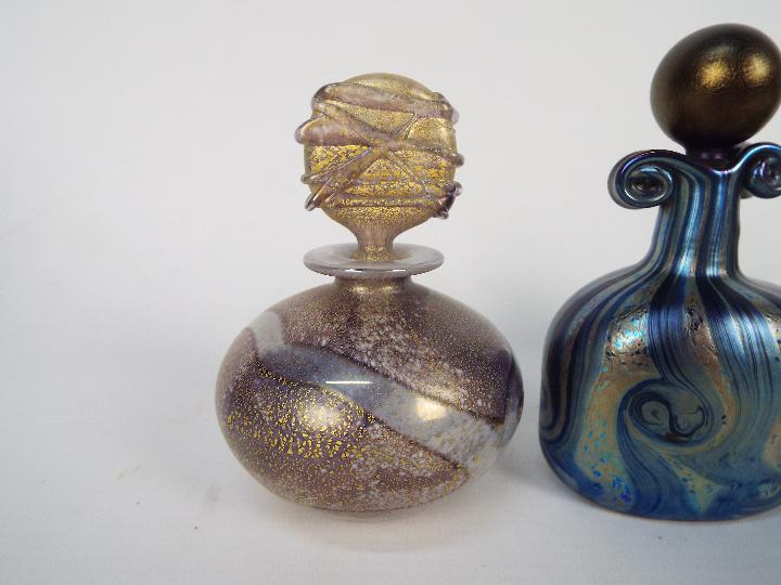 Three Isle Of Wight Glass scent bottles with stoppers, largest approximately 12 cm (h). - Image 2 of 7