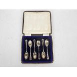 A cased set of six George V silver coffee spoons, Sheffield assay 1920,