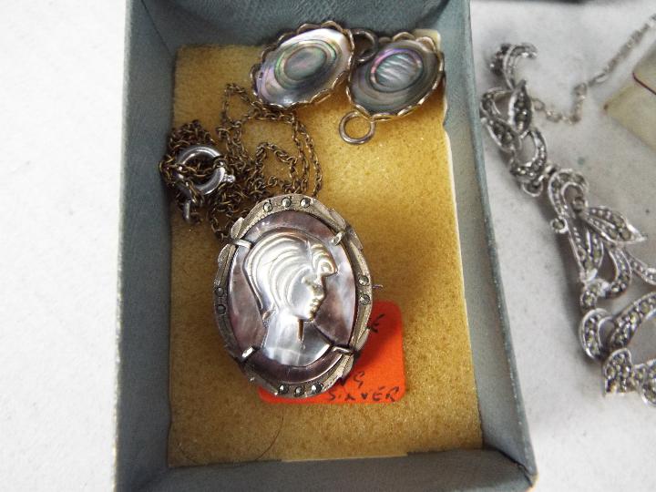 A collection of silver and white metal jewellery to include necklaces (longest 50 cm), locket, - Image 2 of 6