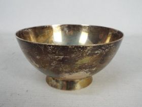 A George V silver footed bowl of simple form, London assay 1922, sponsors mark for Charles Edwards,