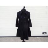 Betty Jackson black - a Betty Jackson black wool three quarters length jacket,