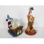 Disney - Two Disney snow globes comprising Fantasia and Disney 100th Year,