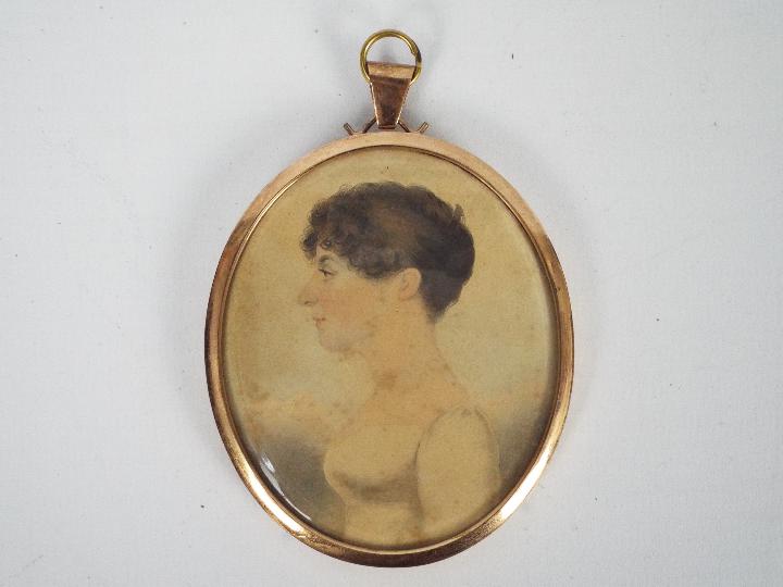 An early 20th century portrait miniature, watercolour on paper,