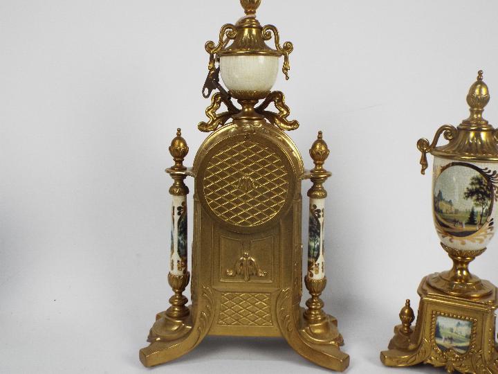 An Italian gilt brass and ceramic clock garniture, signed to the dial Imperial, - Image 10 of 10