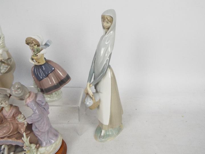 A collection of Lladro and similar figures to include Glorious Spring, # 5284, - Image 5 of 7