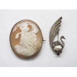 A white metal, French brooch in the form of a bird,