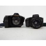 Photography - Two Canon cameras comprising an EOS100 with Sigma UC Zoom 70 - 210mm 1:4 - 5,