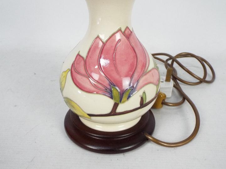 Moorcroft Pottery- a table lamp tubelined and hand painted with pink magnolia on a cream ground, - Image 4 of 5
