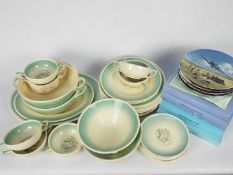 A quantity of Susie Cooper dinner wares in the Dresden Spray pattern,