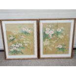 A pair of Chinese gouache paintings of birds perched amongst flowering shrubs, signed by the artist,