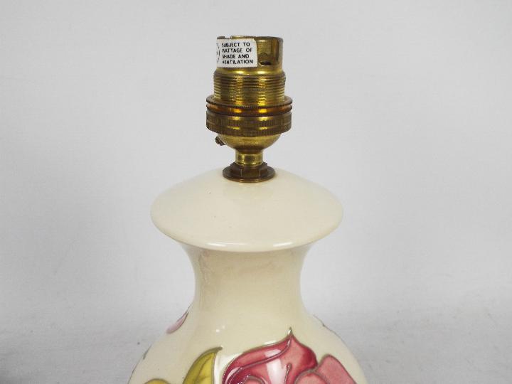 Moorcroft Pottery- a table lamp tubelined and hand painted with pink magnolia on a cream ground, - Image 3 of 5