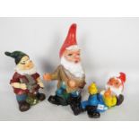 Garden Gnomes - A mixed lot of 3 garden gnomes.