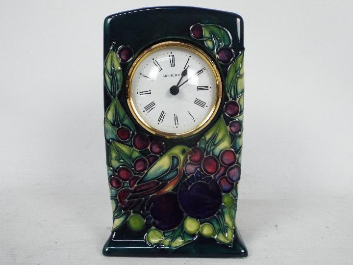 Moorcroft Pottery- a clock, tube lined and hand painted with finch and berries decoration, - Image 2 of 8