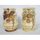 Crown Ducal - two vases of similar design by Charlotte Rhead in the circular fruits pattern # 5982,