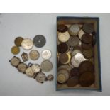 A small collection of UK and foreign coins and a coin bracelet.