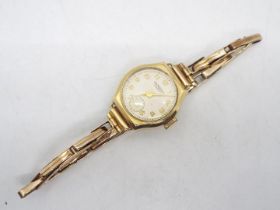 A lady's 9ct gold cased wristwatch on 9ct gold bracelet, 9.1 grams excluding movement.