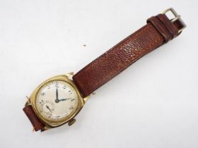 A gentleman's 9ct gold cased wrist watch, approximately 28 grams all in.