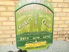 Harlequins Rugby Football Club - a painted wooden sign scribed 'Harlequins Rugby Football Club,