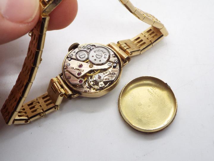 A lady's 9ct gold cased wrist watch on unmarked yellow metal bracelet with safety chain, 17. - Image 4 of 5