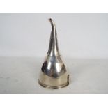 A George III silver wine funnel of simple form, London assay 1801,