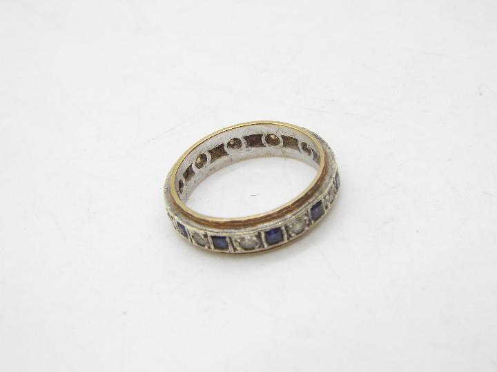 A 9ct gold sapphire and white stone eternity ring, size O , approximately 3.8 grams. - Image 2 of 3