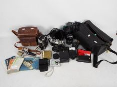 Photography - A Canon AV1 camera, additional lenses, a Bolex Paillard cine camera and similar.