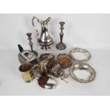 A good collection of silver plated items including a silver plate and brown leather clad hip flask,