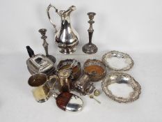 A good collection of silver plated items including a silver plate and brown leather clad hip flask,