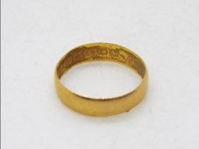 A 22ct gold wedding band, size M½, approximately 2.4 grams.