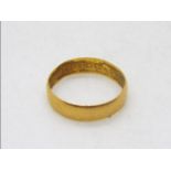 A 22ct gold wedding band, size M½, approximately 2.4 grams.