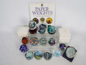 A collection of paperweights to include Avondale Glass, Caithness,
