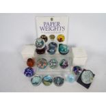 A collection of paperweights to include Avondale Glass, Caithness,