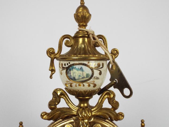 An Italian gilt brass and ceramic clock garniture, signed to the dial Imperial, - Image 3 of 10