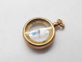 An antique 9ct rose gold cased pocket or fob compass, 16 grams all in.