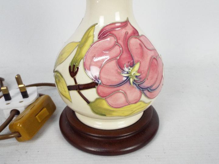 Moorcroft Pottery- a table lamp tubelined and hand painted with pink magnolia on a cream ground, - Image 2 of 5