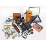 A mixed lot to include binoculars, cased scope on tripod, camera,