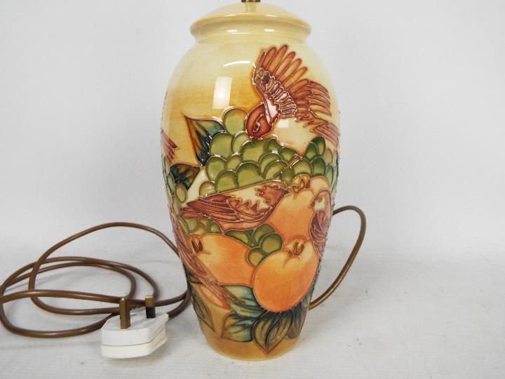 Moorcroft Pottery- a large table lamp tubelined and hand painted with finches and fruits, - Image 2 of 5