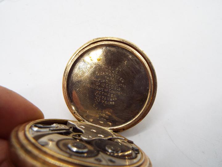 A gold plated, open faced, pocket watch, - Image 5 of 5