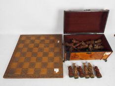 A Chinese style chess set and board with 13 cm king.